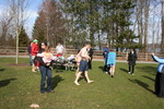 Disrobing.  Temp in the high 40's or low 50's at this point, and a light breeze. But sunny!