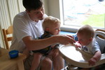 Will helping to feed Nick his first solid food