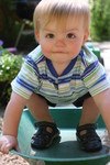 Nick in a mini-wheelbarrow