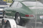 Porsche similar to Bill's getting towed.