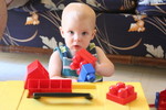 Will loves his new blocks from his cousins Alden and Georgia!