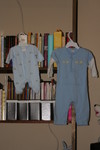 The outfit on the left is the smallest outfit Will wore - it's a preemie size.  On the right is an outfit that fits well now.